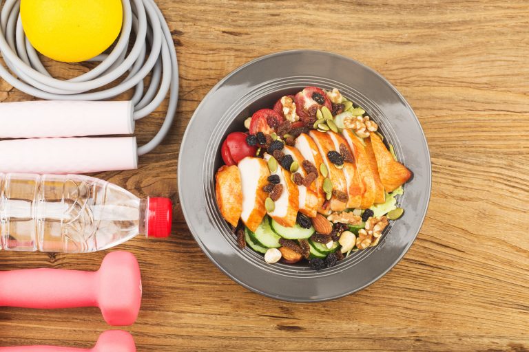 Protein-rich meal with chicken and nuts for OCR athlete recovery nutrition