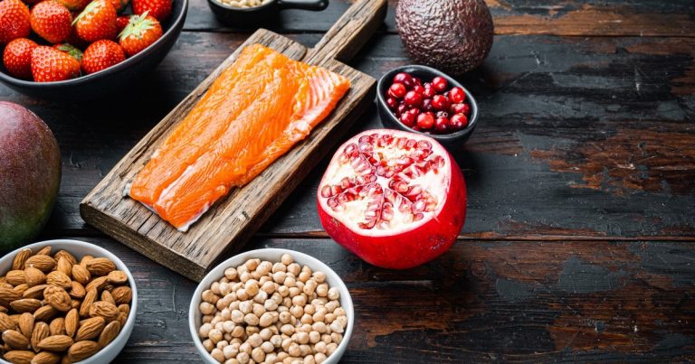 Anti-inflammatory foods for OCR athlete recovery — salmon, berries, nuts, and vegetables