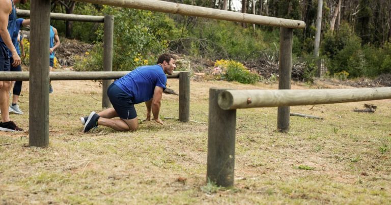 Athlete training on a backyard obstacle course rig