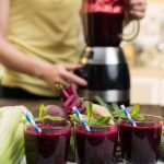 Beetroot smoothie and fresh vegetables for athletic nutrition
