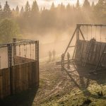 OCR race course being built at dawn, obstacles and terrain setup